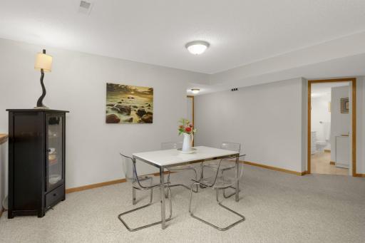 Plenty of room for a game table, puzzles or cardsâcreating a fun second gathering area within the Family Room.