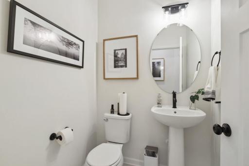 For representational purposes only. The powder room features modern finishes and a convenient location off the main living space.