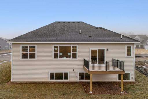 For representational purposes only. Back exterior view showcasing the home's inviting outdoor space and backyard potential.