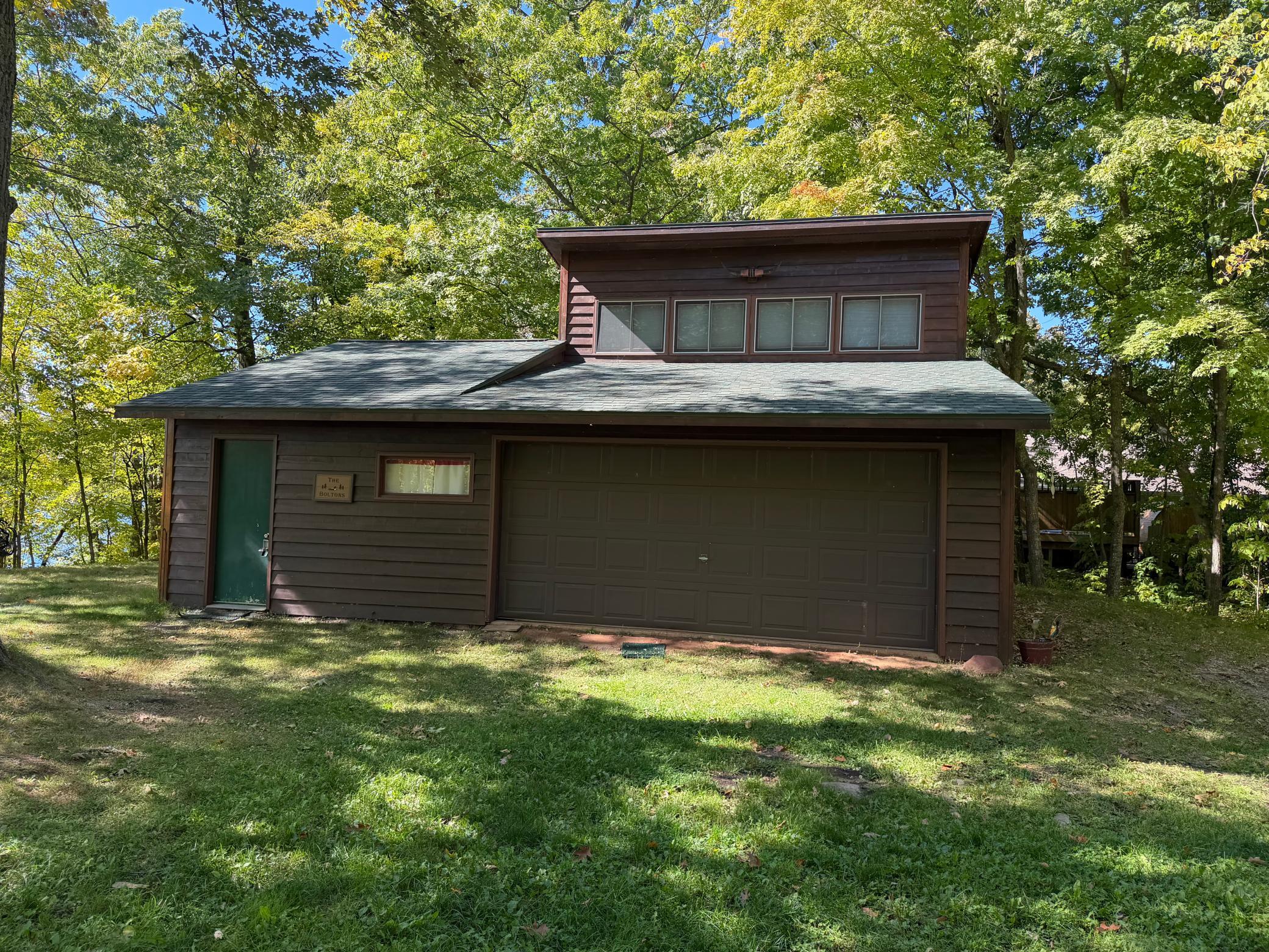 28' deep 2 car garage with potential for a bedroom, kitchen, bath, living room area if finished.