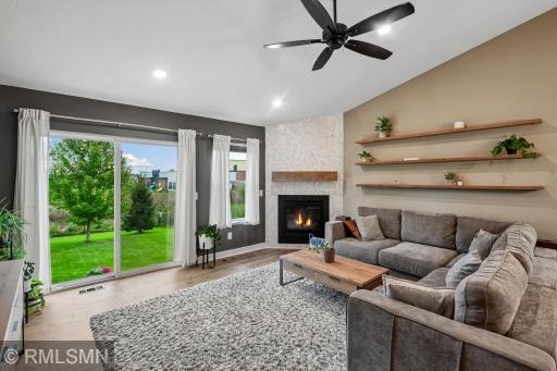 Gas burning fireplace and walkout to patio