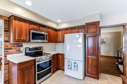 Tile floors, ample countertops and plenty of cabinetry for storage