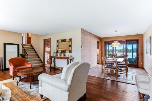 Formal dining room that separates the main living room from the screeened porch