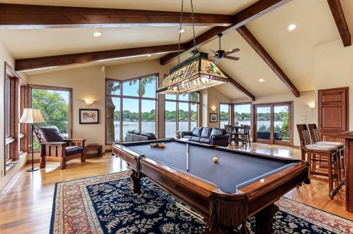 Sunroom addition with vaulted, beamed ceiling