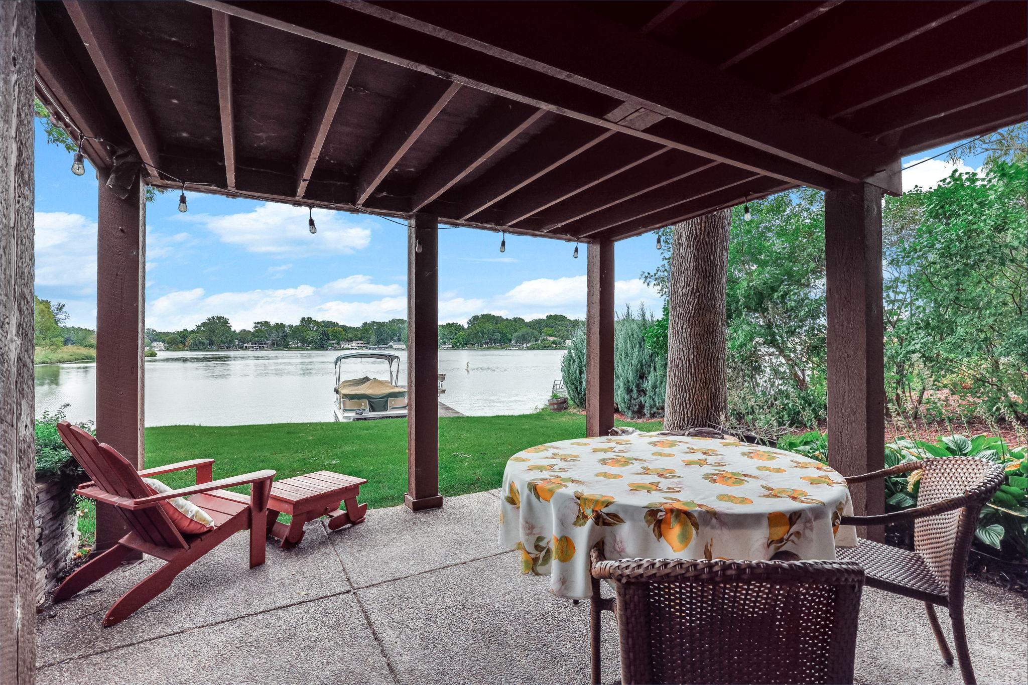 The lower patio is a casual spot to enjoy a book or a beverage