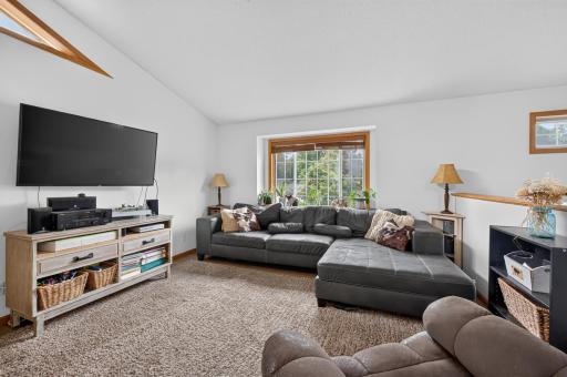 The upper level is bright with many large windows and fresh white paint.