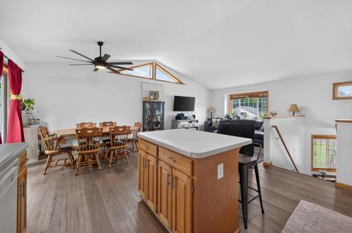 When you walk upstairs you enter the open concept kitchen, dining, and living room area.