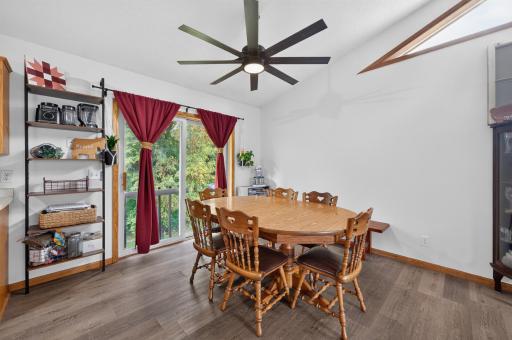 The dining room has plenty of room for a large table. And a future deck could be built out of the patio door.