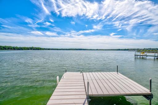 Your own private dock sets the stage for unforgettable summer days spent boating, swimming, and relaxing on the water!