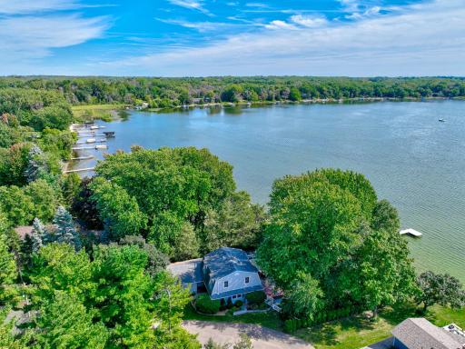 Welcome to 21992 Jason Ave N! Over 100 feet of lakeshore creates an exceptional waterfront setting for enjoying life on the water!