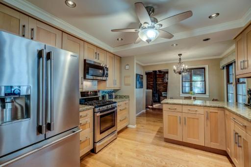 Beautifully updated kitchen featuring stainless steel appliances and sleek granite countertops!
