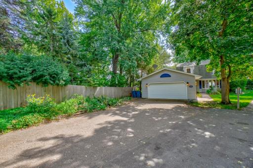 An extra-deep two-car garage offers ample room for vehicles, lake gear, and recreational toys, with the added convenience of a private, non-shared driveway!