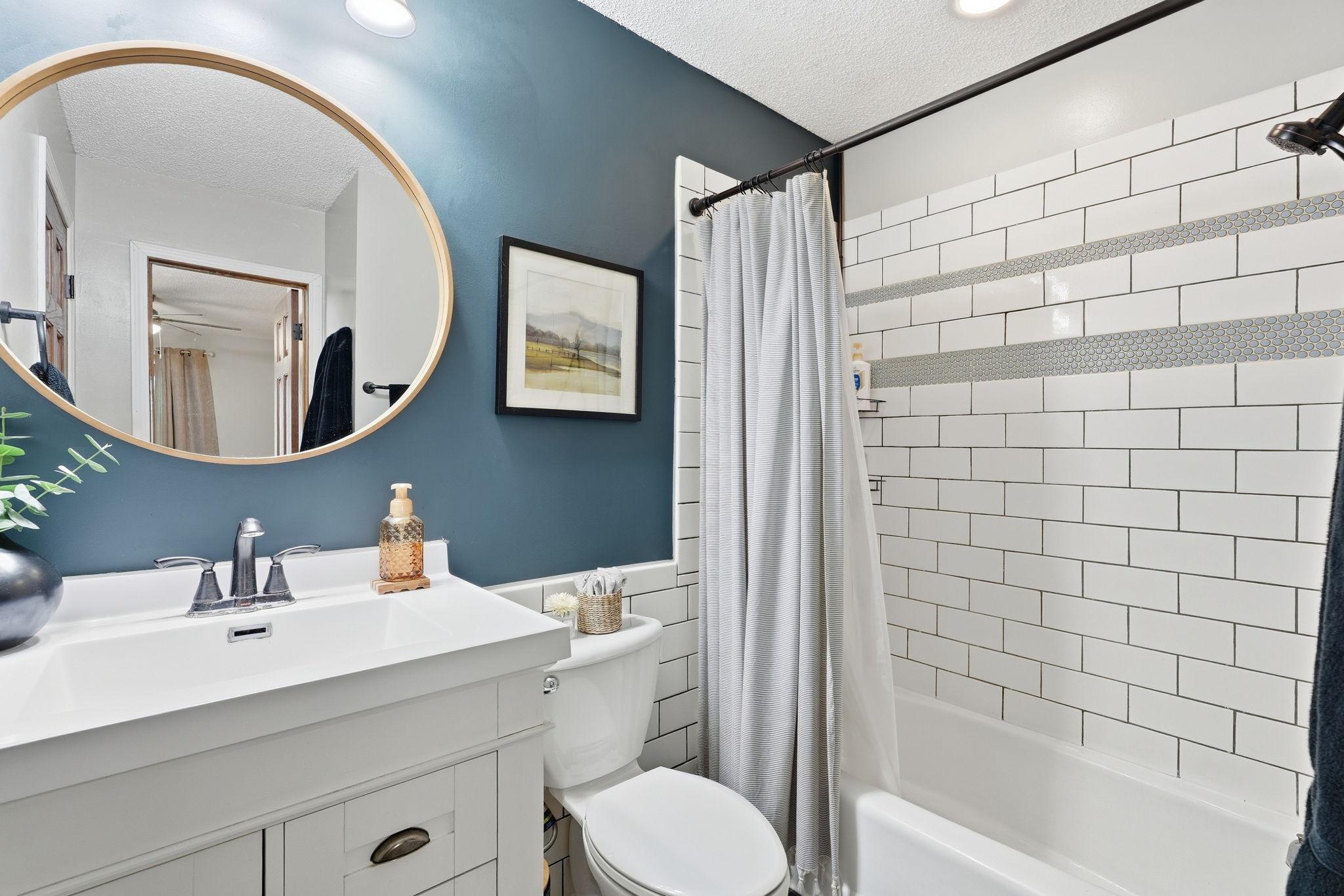 Updated guest full bathroom with walkthrough to the primary bedroom!