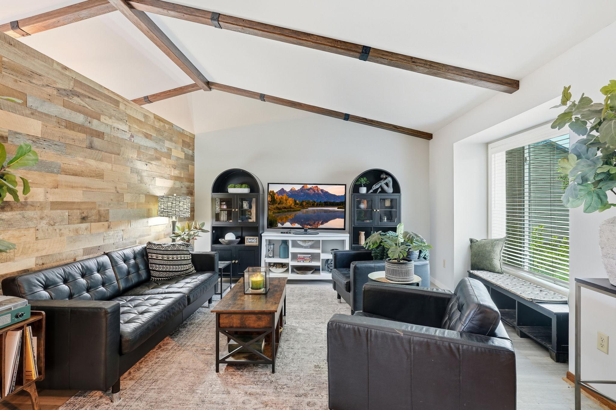 Living room bay window adds natural light.