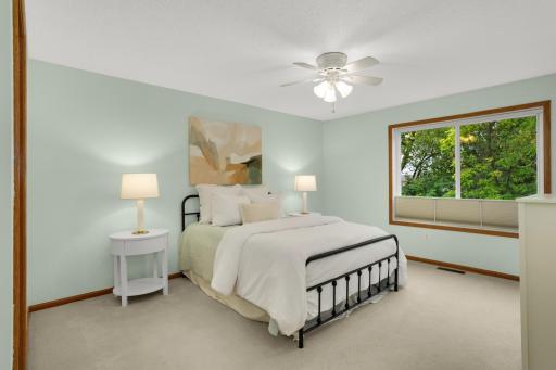 Spacious main-level primary bedroom designed for easy one-level living