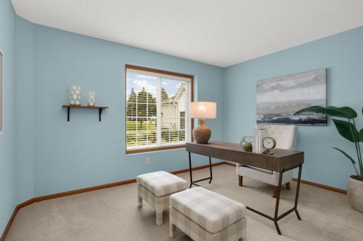 Flexible main-level space perfect for a home office or second bedroom