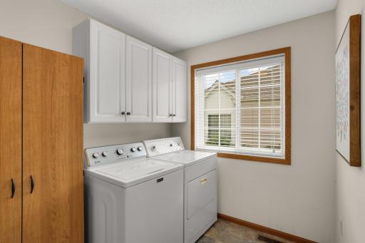 Conveniently located laundry room off the kitchen