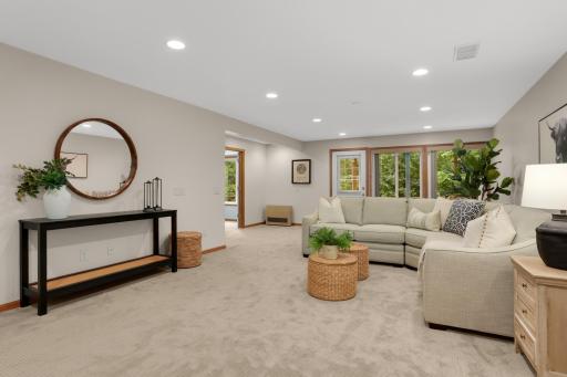 Generous lower-level family room ready for movie nights or gatherings.