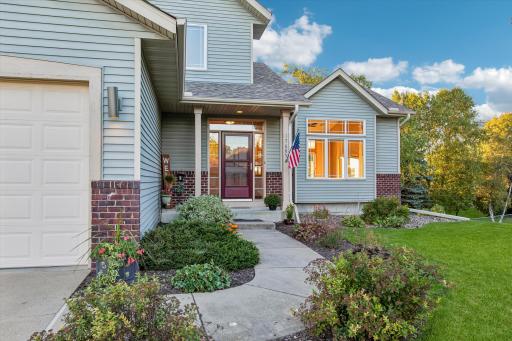 Closer view of the welcoming from step & front door with sidelights on both sides.