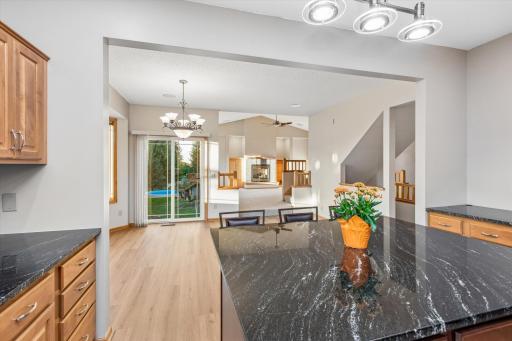 And from the kitchen into the dining room, with the great room in the distance. Great for entertaining!
