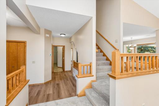 Here's a view from the steps outside of the great room down the hall (with brand-new vinyl/plank flooring) down the hall to the