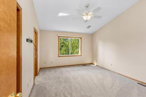 Upstairs is a very spacious vaulted primary bedroom with brand-new carpeting...