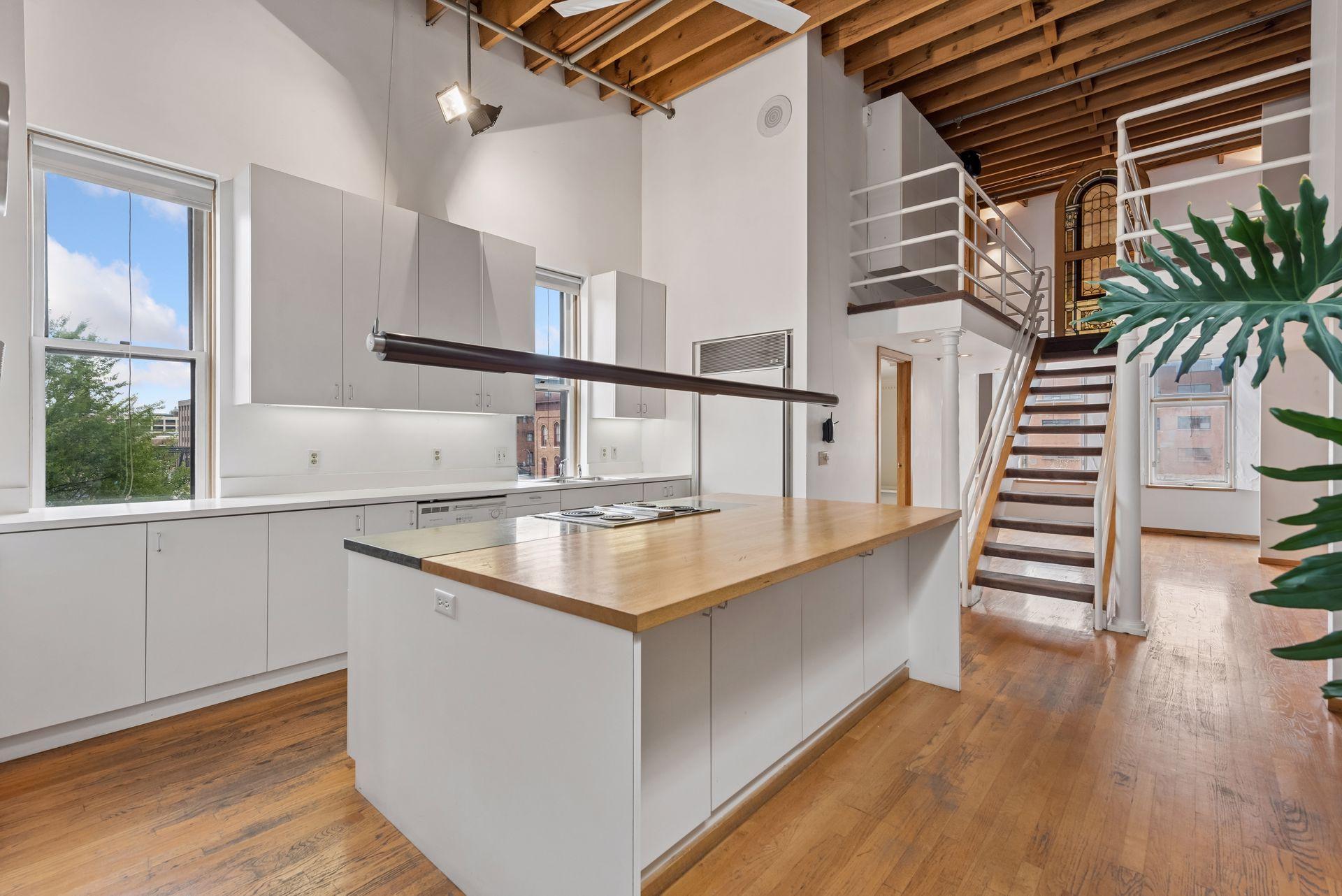 Kitchen Level three..stairs to upper loft
