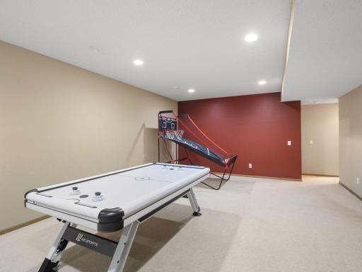 Lower-Level Recreation Room â Large recreation area provides plenty of room for games, hobbies and entertaining.