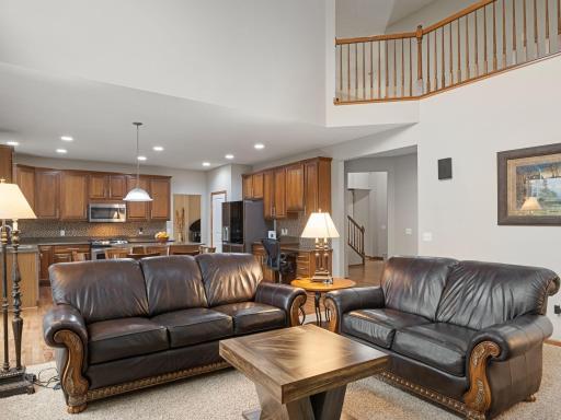 Great Room & Kitchen â Open-concept main level combines the two-story great room and spacious kitchen for easy everyday living and entertaining.