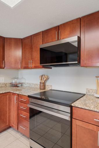 Coordinating stainless steel range and over-the-range microwave create a clean, streamlined look.