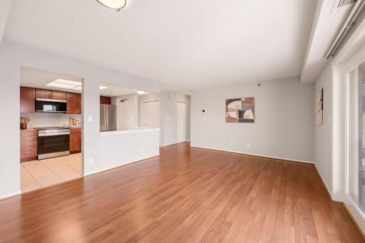 Another view of the expansive living room highlights the open floor plan and abundant natural light.