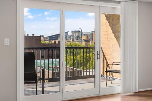 Enjoy views toward Downtown Minneapolis and U.S. Bank Stadium from the living room and balcony.