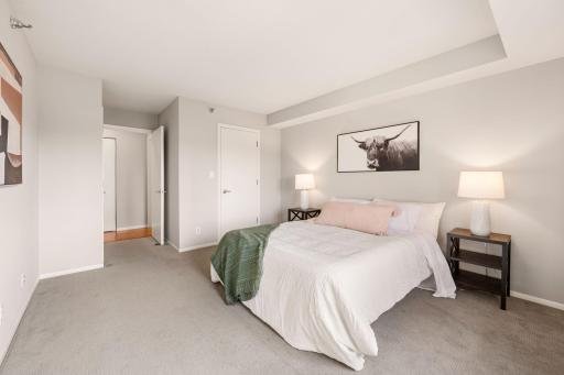 The generous bedroom provides excellent furniture flexibility, neutral finishes, and a calm, comfortable atmosphere.