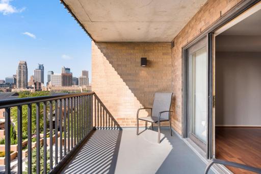 Step onto the private covered balcony and take in breathtaking views of the Downtown Minneapolis skyline.