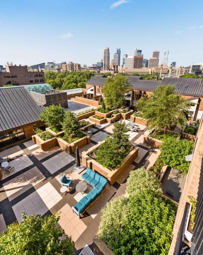 Spectacular views overlook the beautifully landscaped courtyard and stretch all the way to the downtown skyline.
