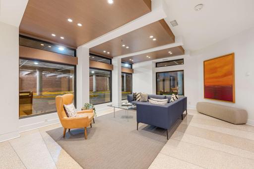 Updated lobby/lounge area with modern seating and convenient garage access.