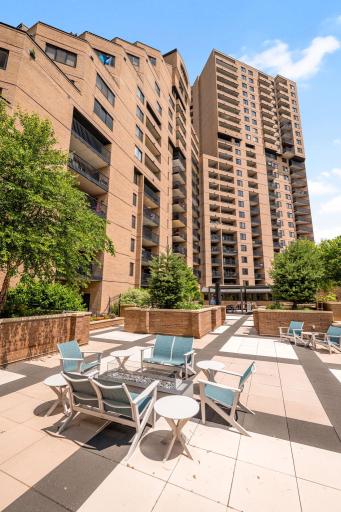 Exterior view of The Falls and Pinnacle with spacious outdoor courtyard seating.