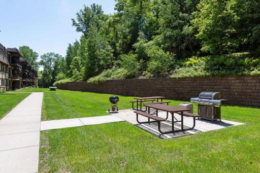 Outdoor grilling and picnic area offers a great space to gather, dine, and enjoy the warmer months.