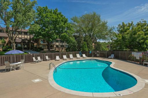 Enjoy warm summer days relaxing by the community pool.