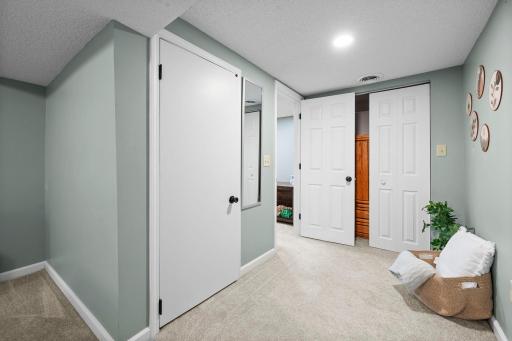 Bonus lower-level nook with double closets & flexible use