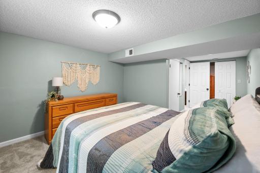 Fourth bedroom offers double closets & calming neutral tones