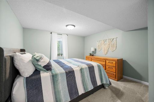 Spacious 4th bedroom in the lower level with egress window