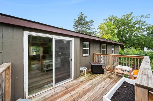 Deck off the dining room with room to grill, dine & relax
