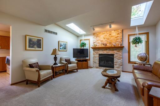 Gorgeous fireplace and skylights