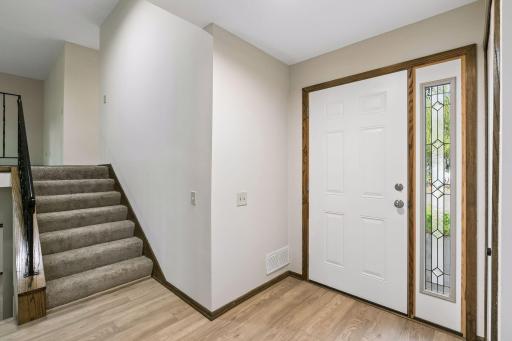 Step inside and discover the many recent improvements! Freshly painted walls, ceilings, and doors, along with new flooring and lighting, create a bright, welcoming first impression.