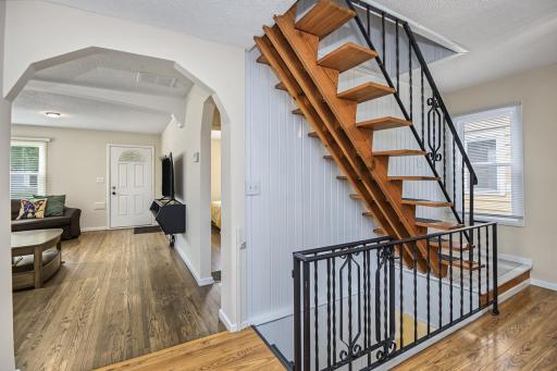 One main floor bedroom with additional rooms upstairs