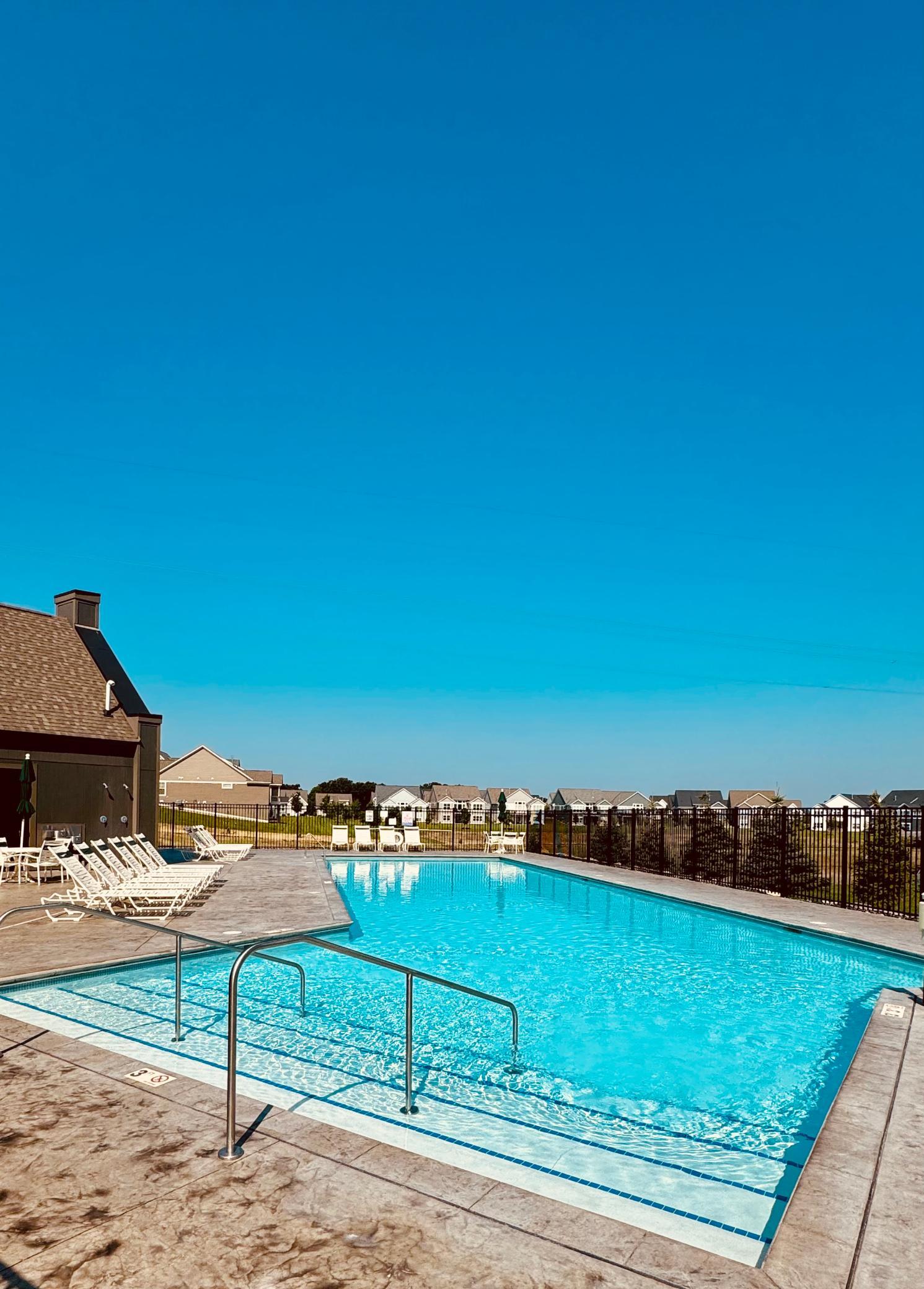 In the hot summer months, cool off at the beautiful community pool.
