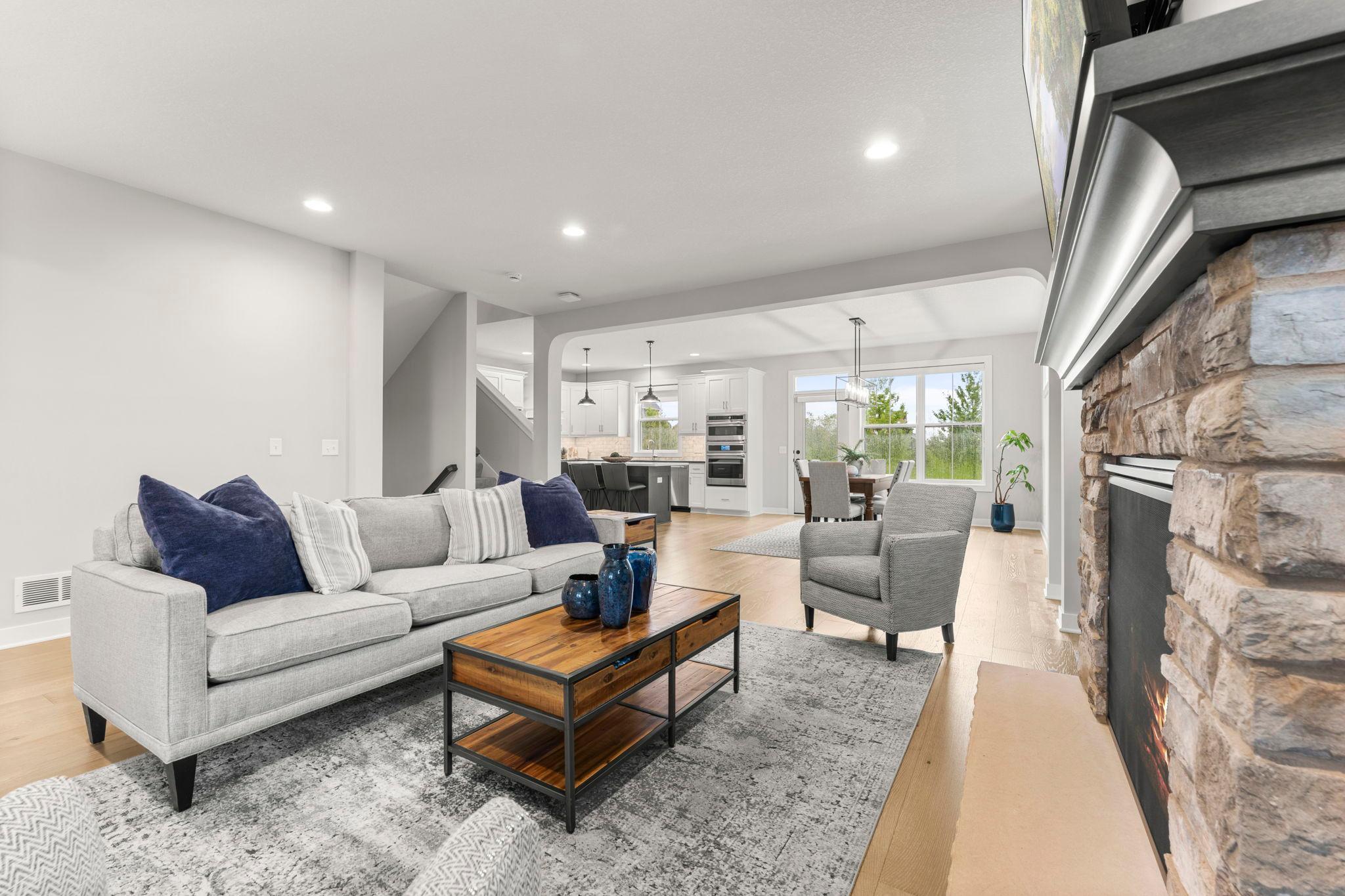 The main level feels open and connected, with the living room, dining area, and kitchen flowing naturally together for everyday life and entertaining.