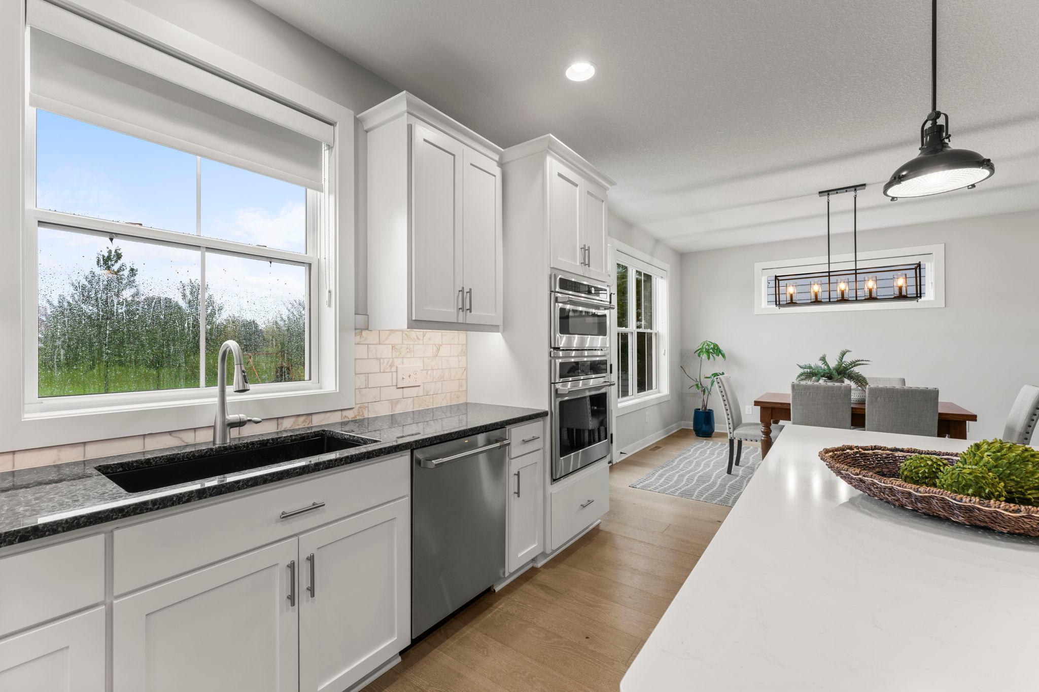 The large windows on the back of the house fill it with lots of natural light.
