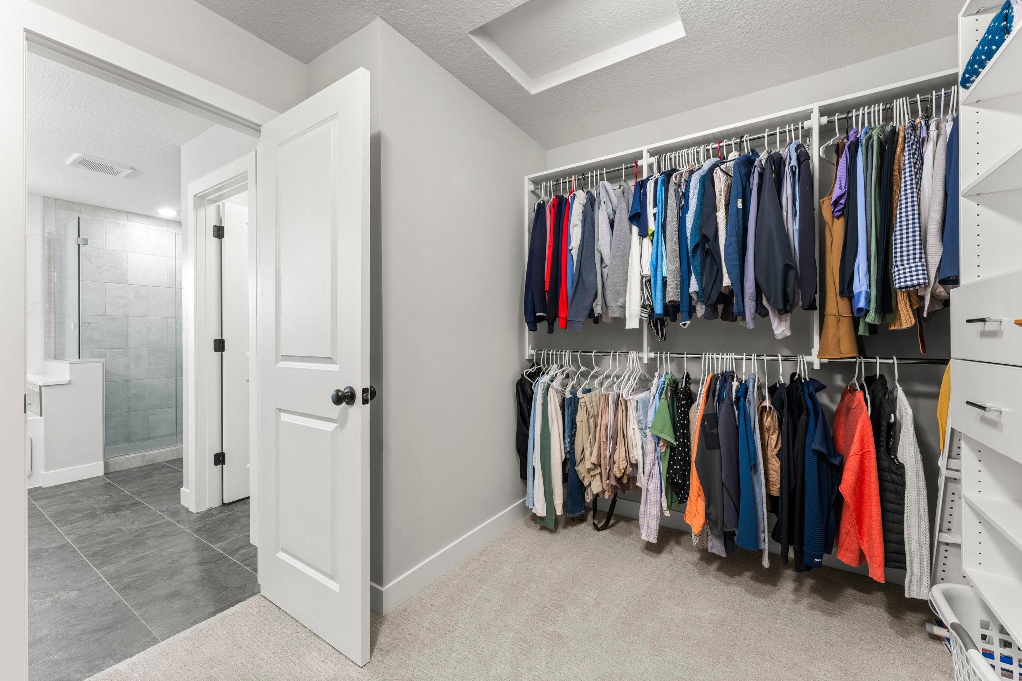 Another view of the walk-in closet showcasing all the room available.